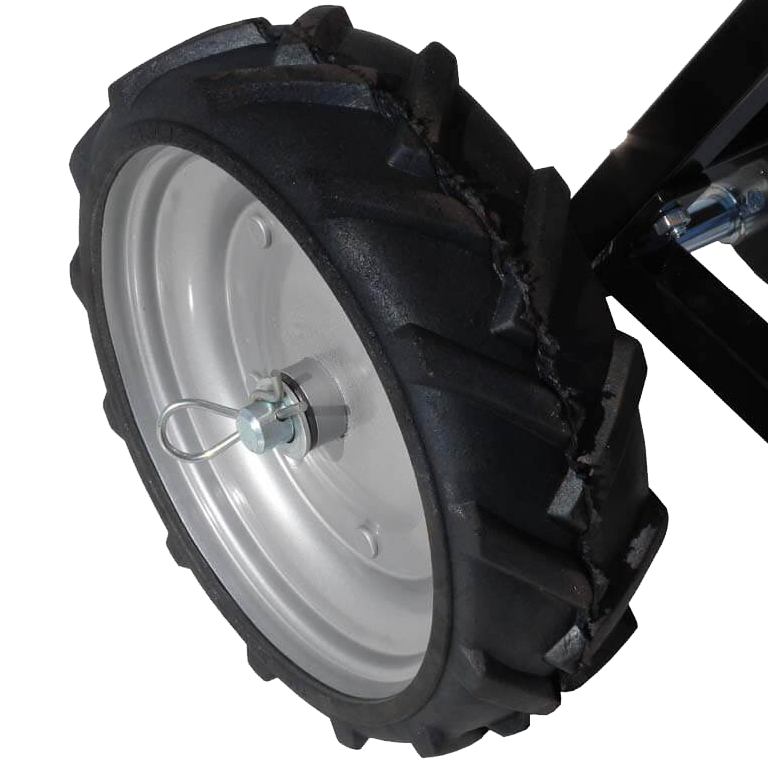 Close-up of BEFCO spreader's solid tire option, providing puncture-proof reliability in rough terrain conditions