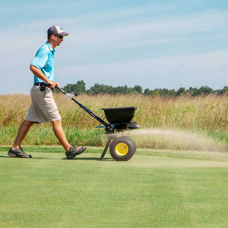 Push Drop Spreader | Walk Behind Style | 50-Lb Capacity | Powder Coated | 13-Inch Wheels | Spyker