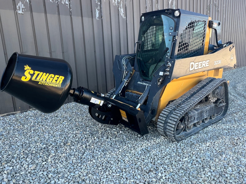 Cement mixer attachment on a skid steer