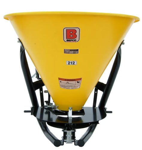 BEFCO PTO broadcast spreader with yellow poly hopper and stainless bottom, ideal for 16-50 HP tractors.