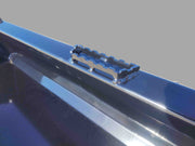 Close-up of EIP Skid Steer Bucket's integrated step, providing safe access for maintenance and operation.