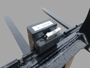 Close-up of Walk Through Pallet Fork Frame's quick attach system, highlighting robust steel and secure mounting.