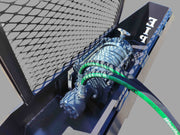 Close-up of Forestry Winch's hydraulic system and cable spool, showcasing robust steel construction and design.