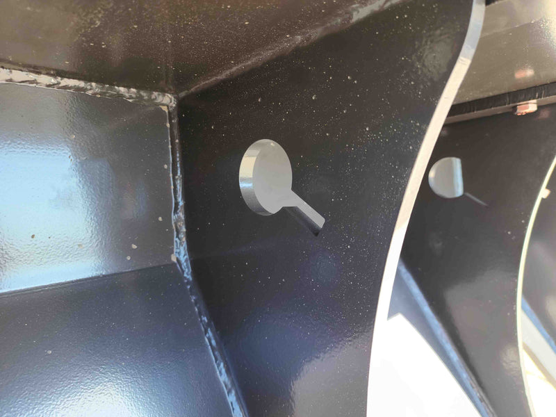 Interior view of Forestry Winch Attachment's steel frame, emphasizing sturdy construction and welding quality.