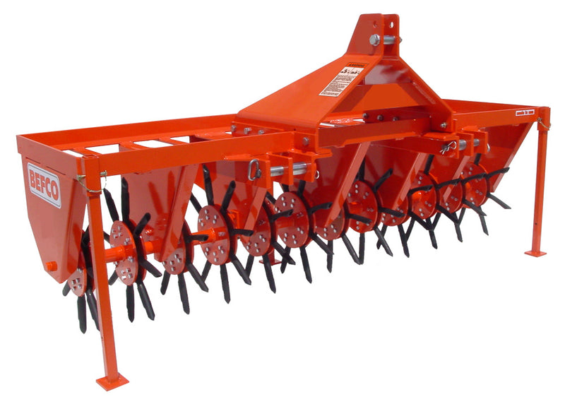 Side view of BEFCO core aerator with multiple rotors and spoons, highlighting heavy-duty construction.