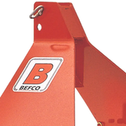 Close-up of BEFCO logo on the red frame of the BPL HD Soil Pulverizer, highlighting brand identity.