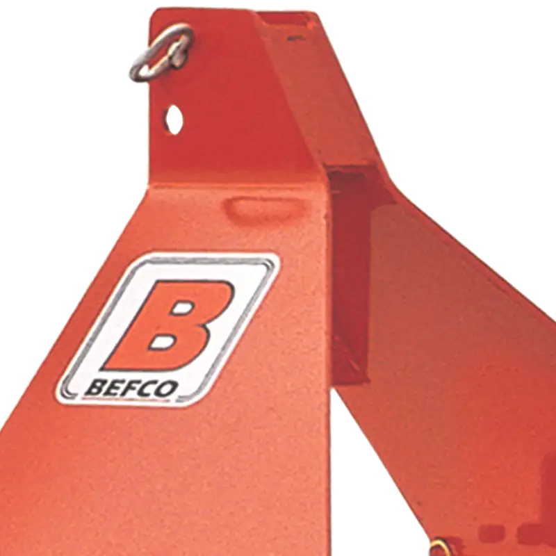 Close-up of BEFCO logo on the red frame of the BPL HD Soil Pulverizer, highlighting brand identity.