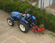Overhead view of tractor with BEFCO Sickle Bar Mower cutting hedges, illustrating vertical cutting angle.