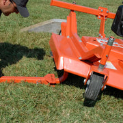 Close-up of BEFCO mower's wheel and hitch, showing the sturdy construction and adjustable swivel locks.