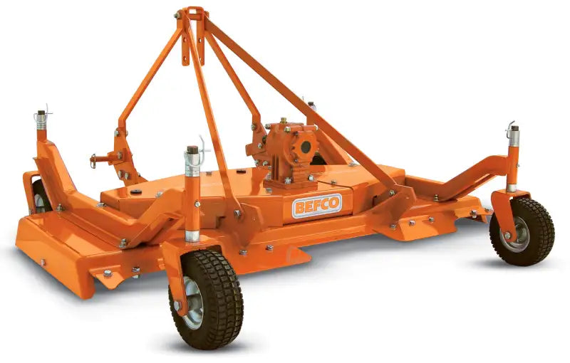Side view of BEFCO CYCLONE C30 mower showing sturdy stamped steel construction and rubber tires.