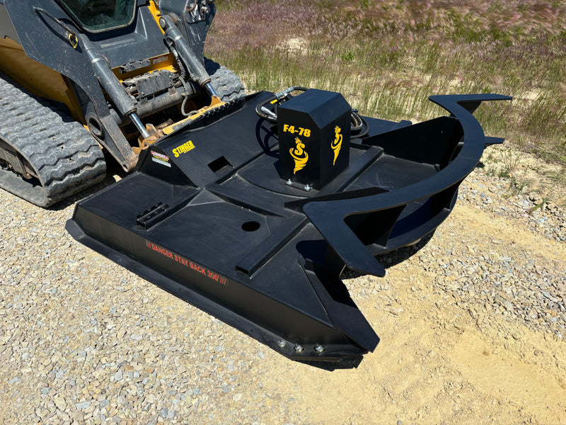 Brush cutter on a skid steer - left side view