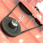 Close-up of BEFCO CYCLONE SUPER-FLEX mower's belt system, showcasing manual tensioning for extended belt life.
