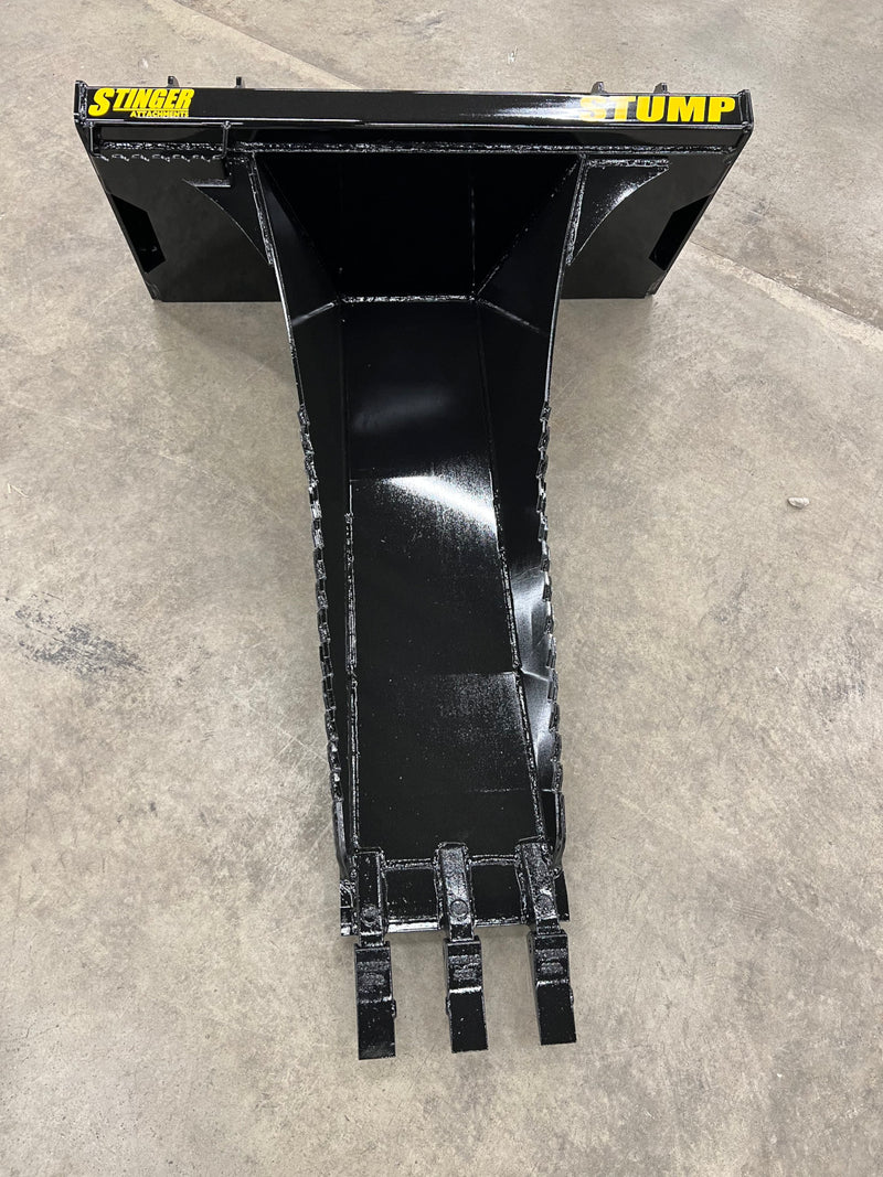 Top view of Stinger Attachments Tractor Stump Bucket showing narrow spade and reinforced frame.