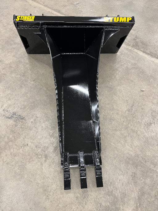 Top view of Stinger Attachments Tractor Stump Bucket showing narrow spade and reinforced frame.