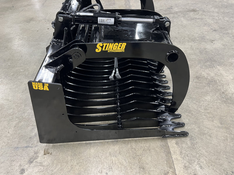 Skid Steer Rock Grapple Bucket (RG) from Stinger Attachments