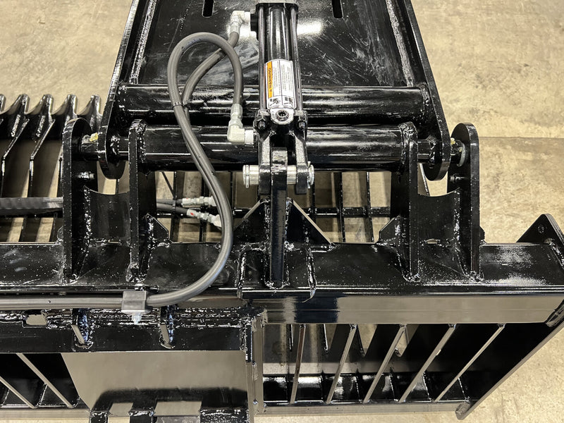 Skid Steer Rock Grapple Bucket (RG) from Stinger Attachments