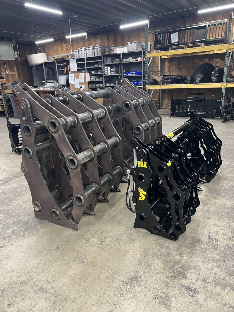 Clam Grapples in warehouse