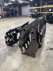 Side view of Clam Grapple in warehouse