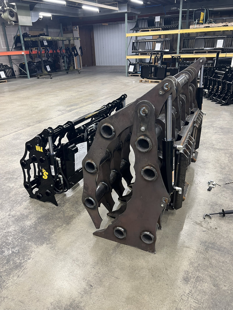 Side view of Clam Grapple in warehouse