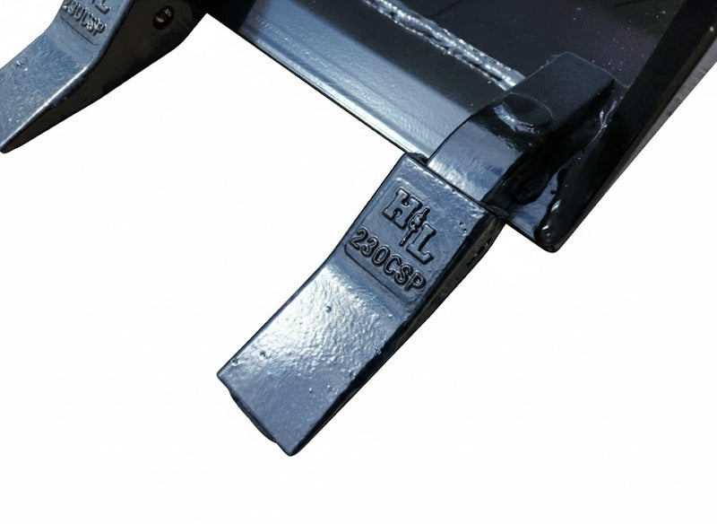 Detail of H&L Tooth Company adapter on Skid Steer Tooth Bucket, emphasizing the welded tooth design.