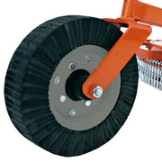 Close-up of heavy-duty laminated tail wheel on BEFCO TORNADO RHD rotary cutter, designed for rough terrain.