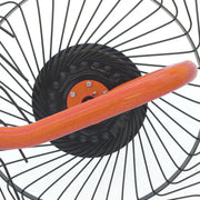 Detail of BEFCO hay rake wheel, featuring spring steel tines and upward-bent elbows for efficient hay flow.