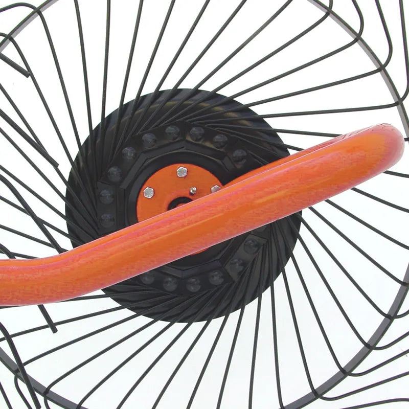 Detail of BEFCO hay rake wheel, featuring spring steel tines and upward-bent elbows for efficient hay flow.