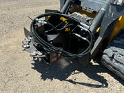 Stump grinder on a skid steer - close up left view