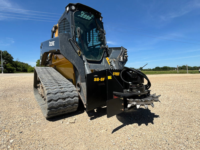 Stump grinder on a skid steer - right side view