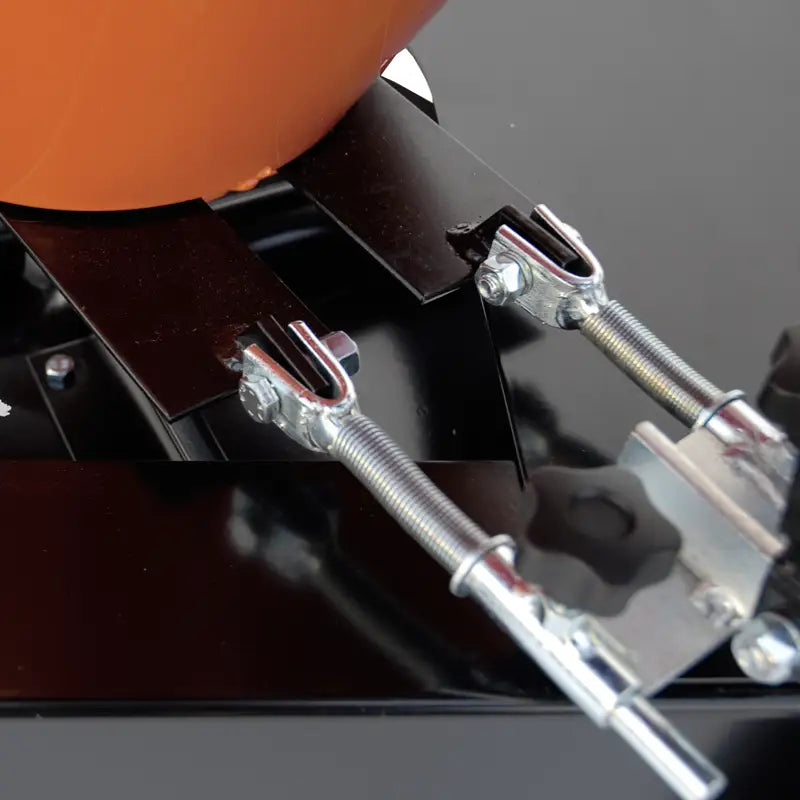 Detailed view of BEFCO PTO Broadcast Spreader's attachment mechanism, showcasing its robust construction.