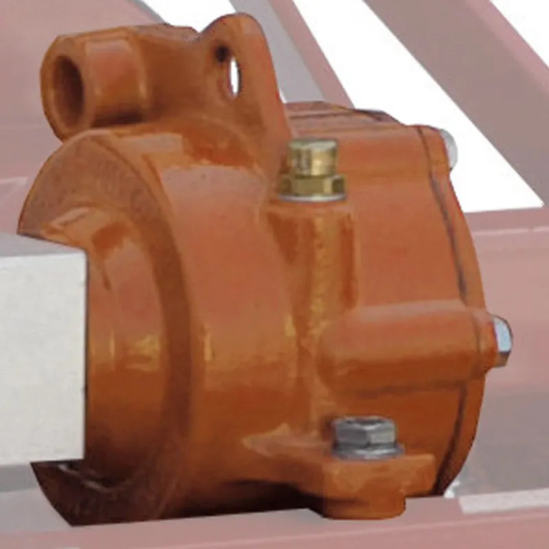 Close-up of BEFCO rotary tiller's gearbox, highlighting high-strength steel construction and design.