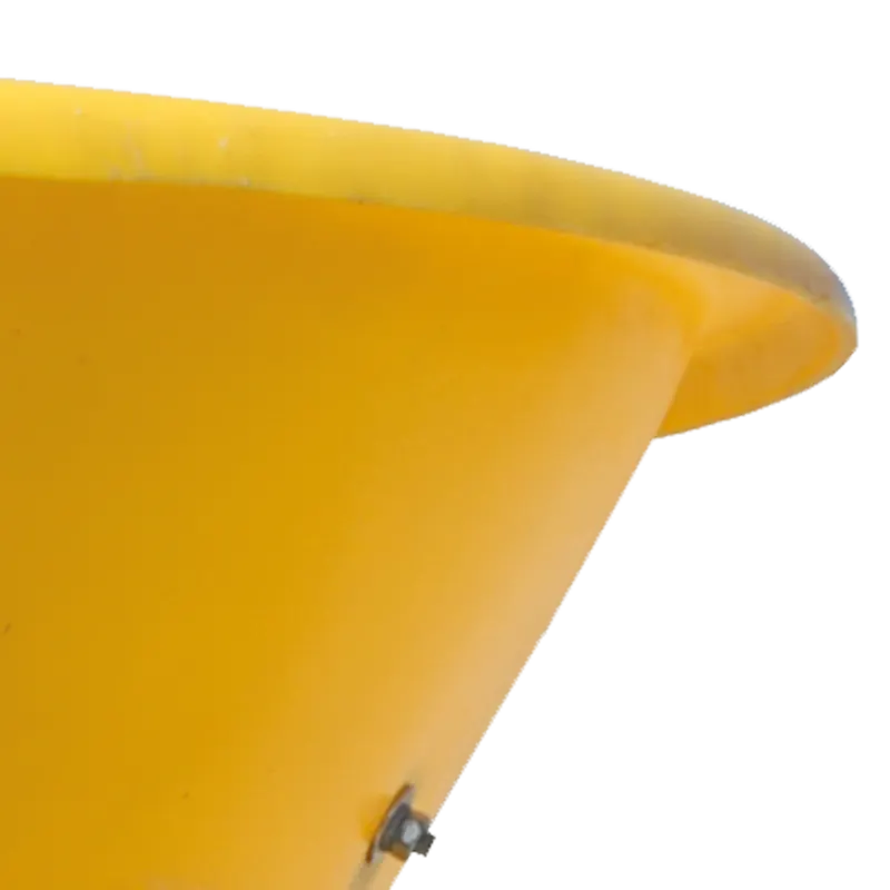 Detail of BEFCO spreader's yellow polyethylene hopper edge, highlighting its thick and durable construction.