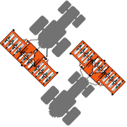 Diagram showing BEFCO core aerator's reversible mounting options on a tractor, illustrating flexibility.