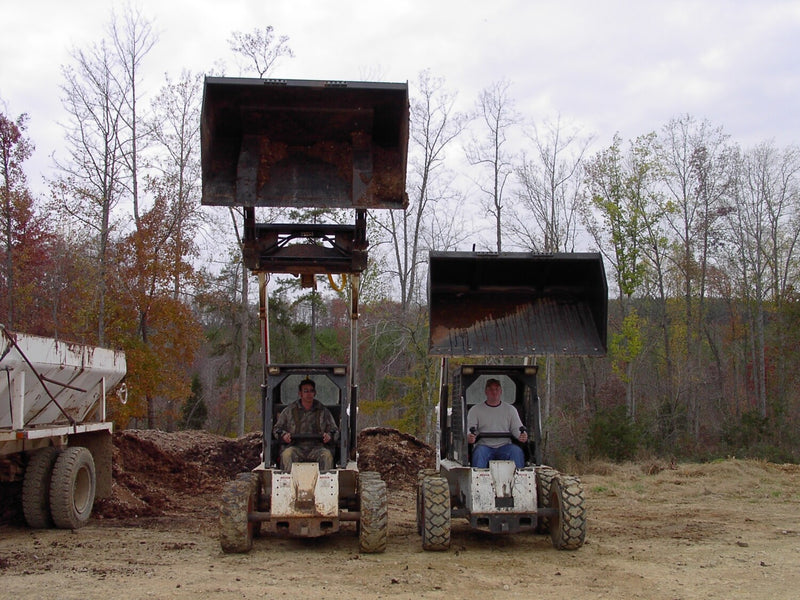 Skid Steer Front Dump Bucket – Extended Reach for Tall Truck Loading