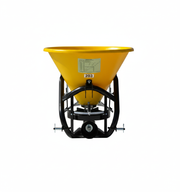 Front view of BEFCO PTO broadcast spreader model 203, featuring a yellow poly hopper and steel frame.