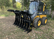 Yellow John Deere Bull Dozer with Stinger Attachment and operator